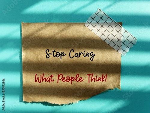 Obraz na plátne Torn stick note with handwritten text STOP CARING WHAT PEOPLE THINK, self remind