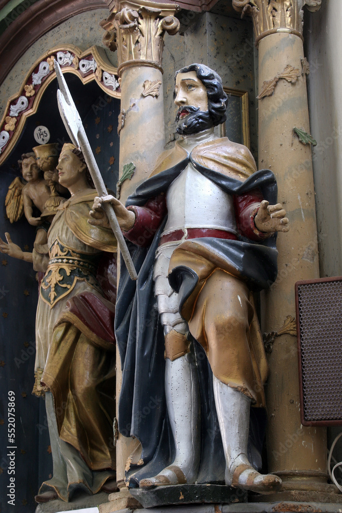 Fototapeta premium Statue of the Saint on the altar of Saint Barbara in the parish church of Saint George in Durdic, Croatia