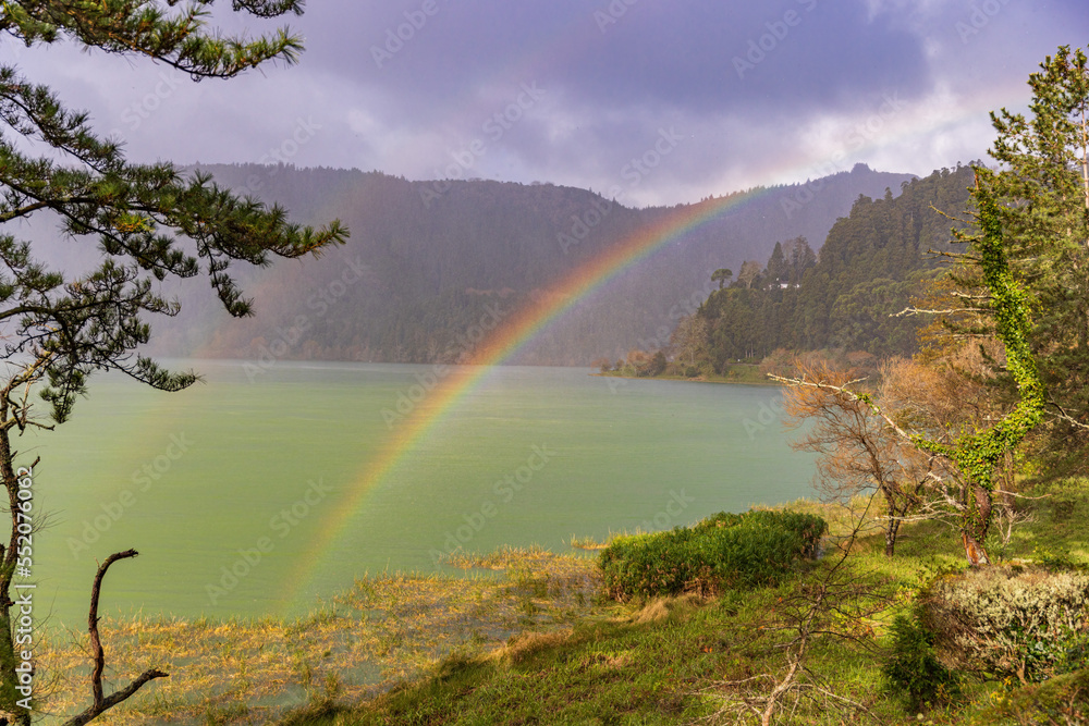 Rainbow over the crater lake Furnas on Sao Miguel Island