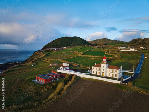 View on the Lighthouse Farol da Ferraria on Ponta Ferraria on the Azores, Island of Sao Miguel