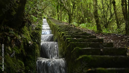 Artificial cascade of the Levada do furado in Ribeiro Frio on Madeira island Portugal photo