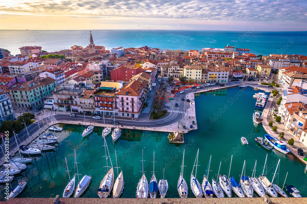 Town of Grado colorful central channel harbor aerial sunset view