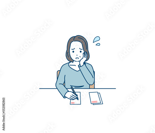 年賀状や葉書を書くのに困る中年の女性のイラスト
