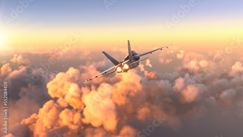 Militar aircraft flying over the clouds in amazing sunset