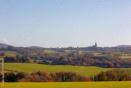 Autumn landscape of hilly countryside in Zuid-Limburg, Small houses on hillside with sunlight in the morning, Gulpen-Wittem is a villages in southern part of the Dutch province of Limburg, Netherlands photo