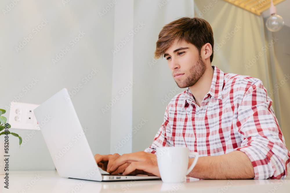Young Man Working at the Office Young Man Working at the Office
