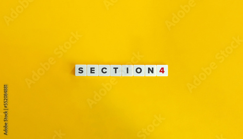 Section Four (4) Banner and Word on Block Letter Tiles on Yellow Background. Minimal Aesthetics.