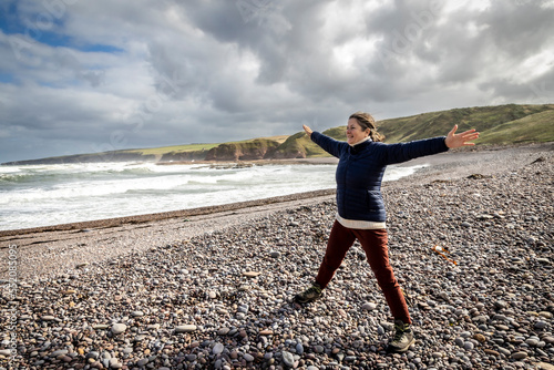 Obraz na płótnie woman on the north east coast of Scotland, New Aberdour beach near Rosehearty w salonie