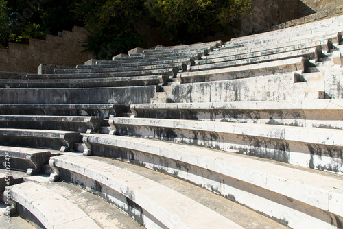 Odeon a classic greek open-air theatre. Old theater with marble seats and stairs. The Acropolis of Rhodes. Monte Smith Hill, Rhodes island, Greece