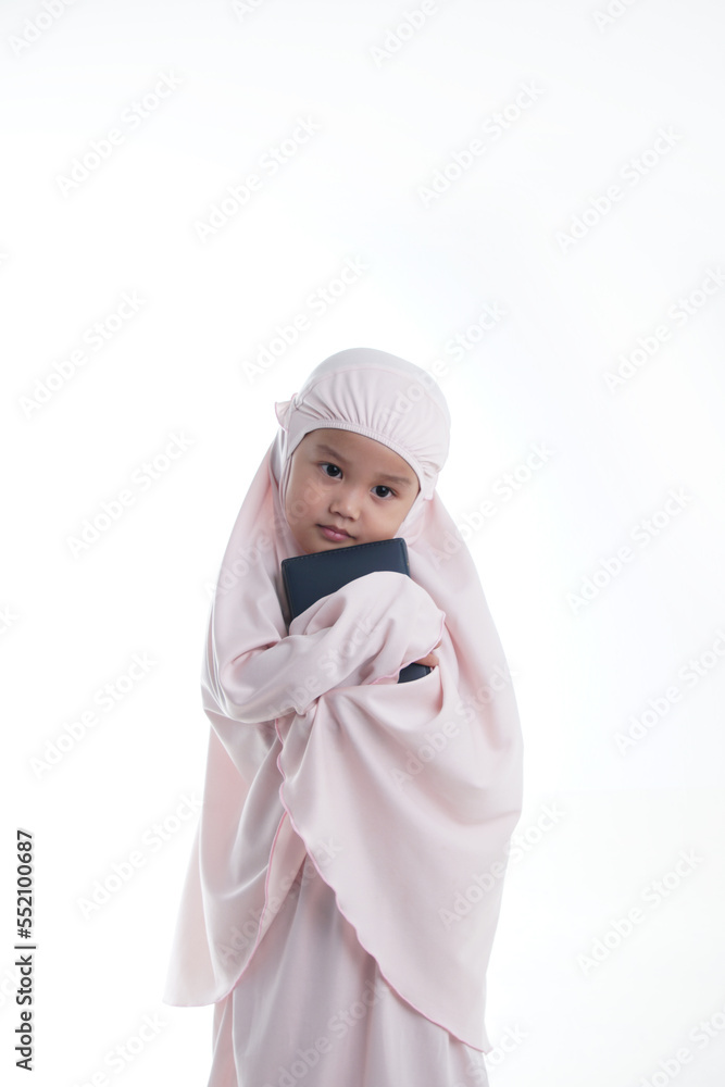 Pretty Muslim Hugging Loves Holy Book of Quran Isolated on White Background Pretty Muslim Hugging Loves Holy Book of Quran Isolated on White Background