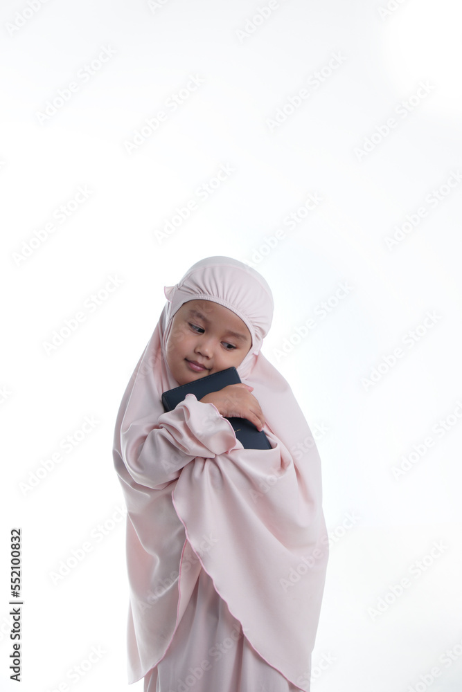 Pretty Muslim Hugging Loves Holy Book of Quran Isolated on White Background Pretty Muslim Hugging Loves Holy Book of Quran Isolated on White Background