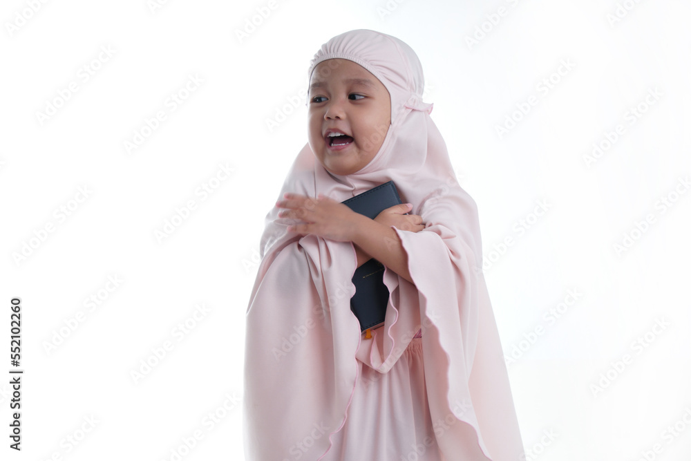 Pretty Muslim Hugging Loves Holy Book of Quran Isolated on White Background Pretty Muslim Hugging Loves Holy Book of Quran Isolated on White Background