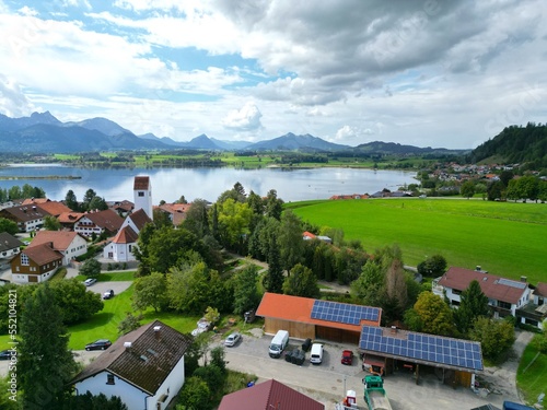 Fototapeta Naklejka Na Ścianę i Meble -  Hopfensee lake and town Hopenfen Swabia  Bavaria Germany drone aerial view
