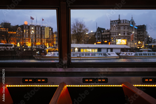 Photography view out of the boat window at harbour at night