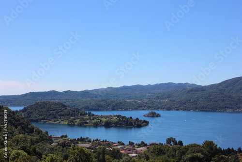Panorama of Lake Orta in Piedmont (Piemonte), Italy with the St. Julius Island (Isola di San Giulio) and the town of Orta San Giulio in the center.