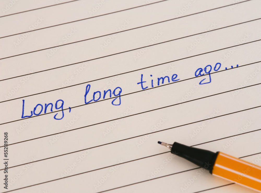 Handwriting text Long, Long Time Ago... on lined paper with pen. Photos |  Adobe Stock