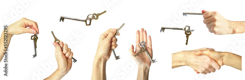 Hand giving keys on white background. close up view hand of property realtor / landlord giving key house to buyer / tenant.