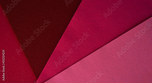 color abstract background for decoration. felt sheets of burgundy color. lines, geometry. viva magenta, the color of the year.