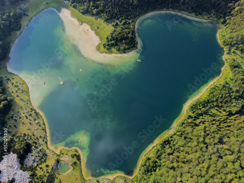 Trnovacko lake, mountain Maglic, Montenegro. Heart shaped lake, aerial drone view. 