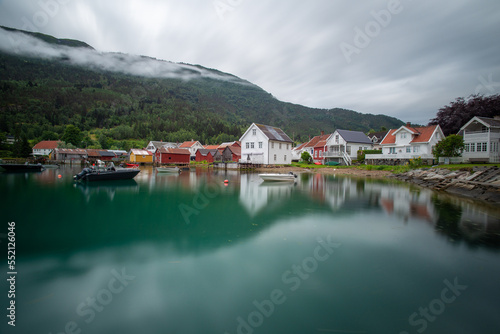 The harbor of the village of Solvorn Norway on a cloudy day 
