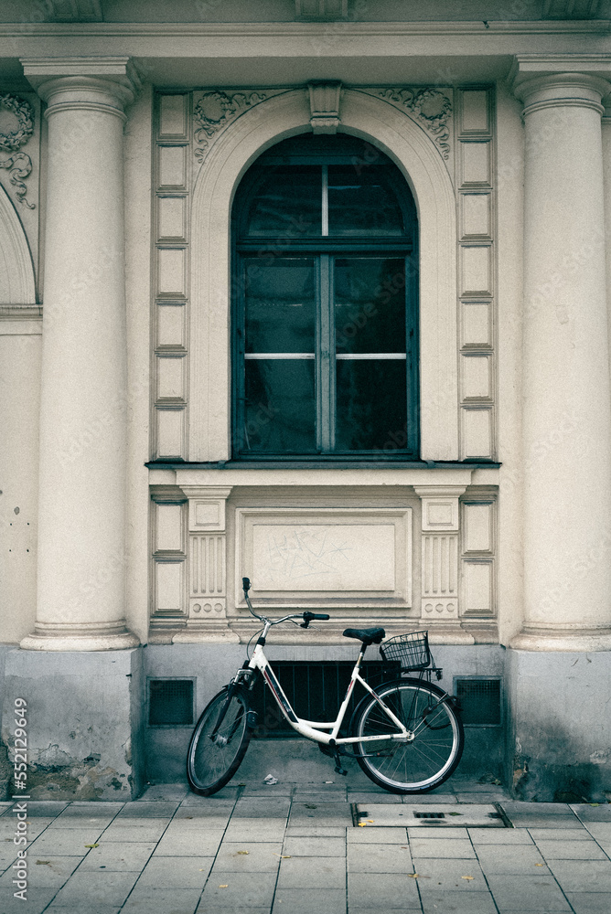 An individual bike parked on a Munich Street, Munich Germany An individual bike parked on a Munich Street, Munich Germany