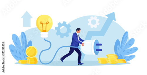 Businessman holding electrical plug with cord, connecting light bulb to power outlet. Business idea, solution. Investment in new project development, startup. Search for ideas and brainstorming