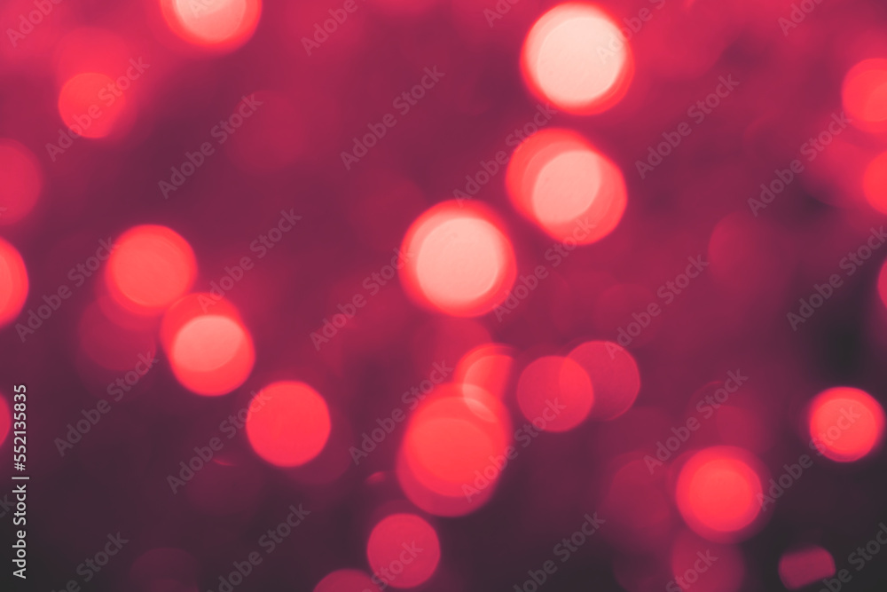 Abstract background of blurred pink lights for design. Lights bokeh dis focus. Christmas background, copy space