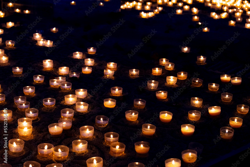 Candles, numerous candles on a table and bokeh effect. Candles, numerous candles on a table and bokeh effect.