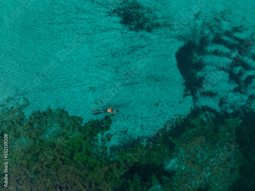 Wallpaper Mural Aerial views with person snorkeling off the coast of Europe Torontodigital.ca