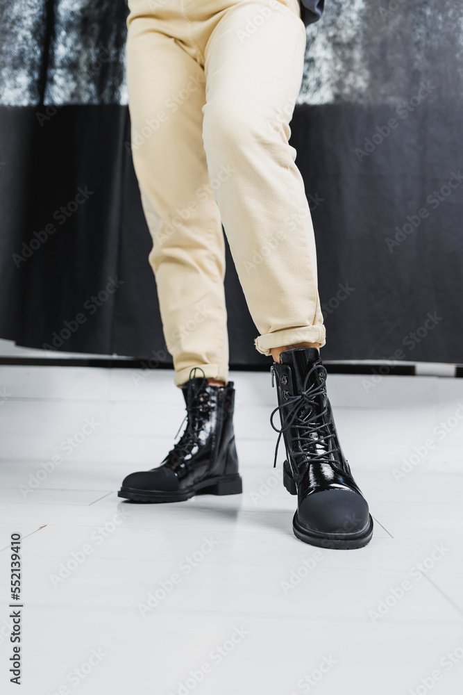 Fashionable women's stylish leather boots. Black women's boots made of genuine leather. New collection of winter shoes for stylish girls. Fashionable women's stylish leather boots. Black women's boots made of genuine leather. New collection of winter shoes for stylish girls.