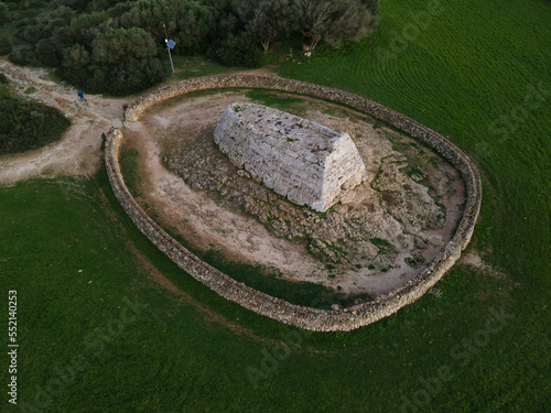 4k aerial views of the Naveta des Tudons, a prehistoric monument of the Balearic archipelago.