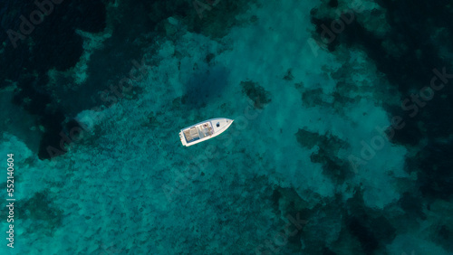 aerial imagery 4k of land and sea with boats © ruben
