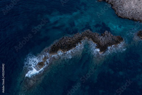 aerial views with 4k drone, centinal direction of rocks and sea.