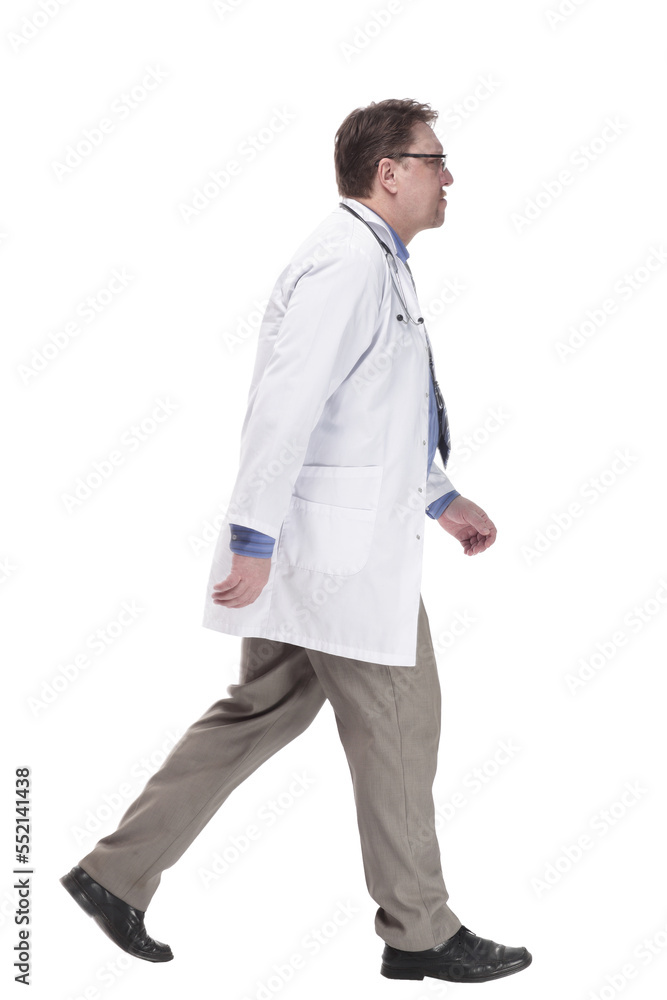 serious doctor in a white coat striding forward. serious doctor in a white coat striding forward.