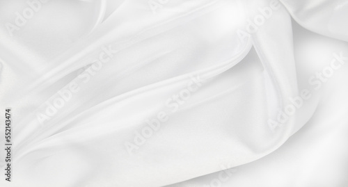 Rippled white silk fabric texture background 