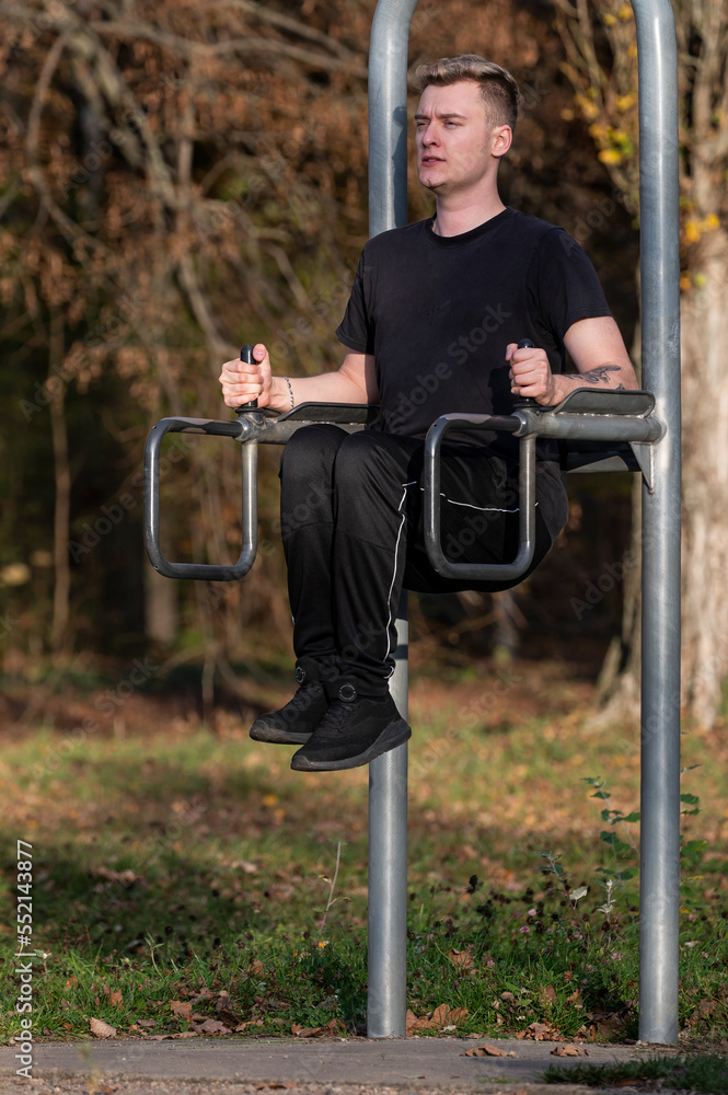 Fototapeta premium Man at the gym outdoors.
