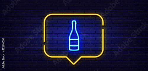 Neon light speech bubble. Champagne bottle line icon. Anniversary alcohol sign. Celebration event drink. Neon light background. Champagne bottle glow line. Brick wall banner. Vector