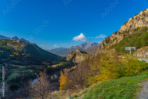 Landscape in the French southern alps in the middle of a large valley in autumn