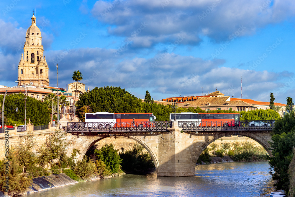 Obraz premium Panoramic view of the Puente de los Peligros in Murcia, with the lower Segura river and the Cathedral Tower in the background.