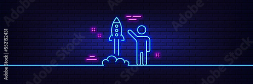 Neon light glow effect. Launch project line icon. Startup rocket sign. Innovation symbol. 3d line neon glow icon. Brick wall banner. Launch project outline. Vector