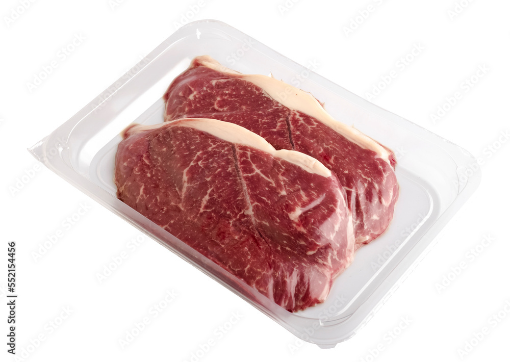 Fresh raw beef steaks in vacuum packaging on a transparent background. isolated object Fresh raw beef steaks in vacuum packaging on a transparent background. isolated object
