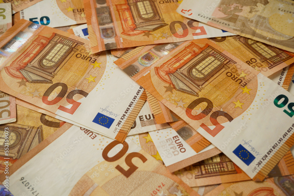 euro money on wooden background. euro cash. euro money banknotes stack euro money on wooden background. euro cash. euro money banknotes stack