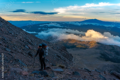 a man ascending the pico de orizaba volcano