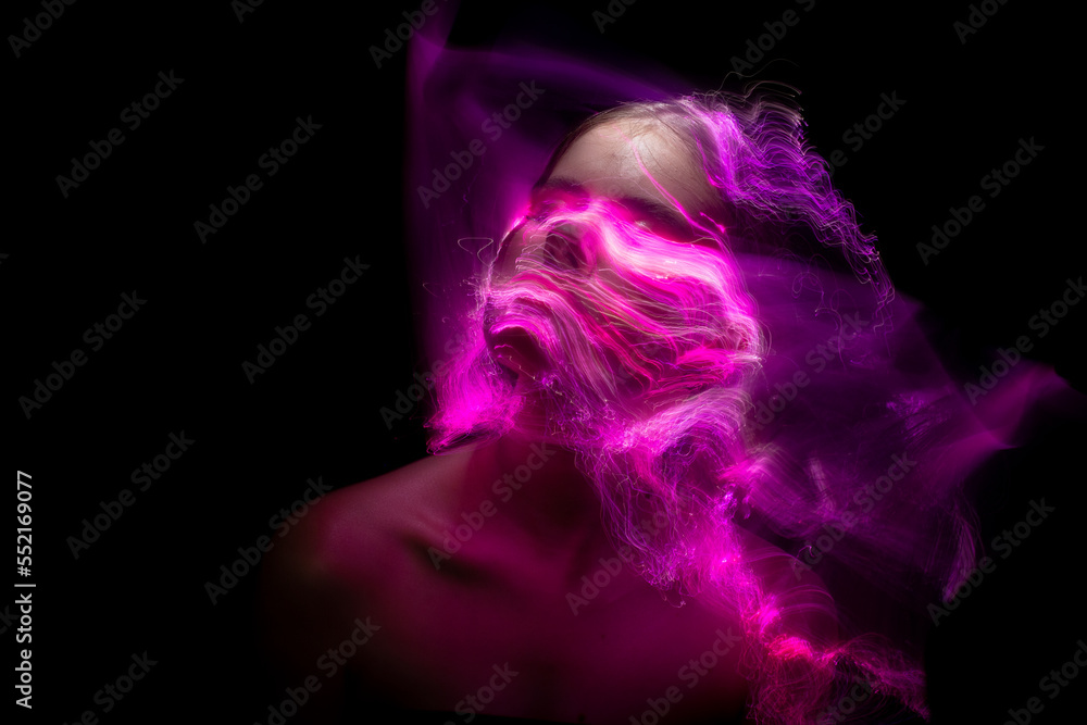 Abstract photography in the style of light painting. girl on a black background Abstract photography in the style of light painting. girl on a black background