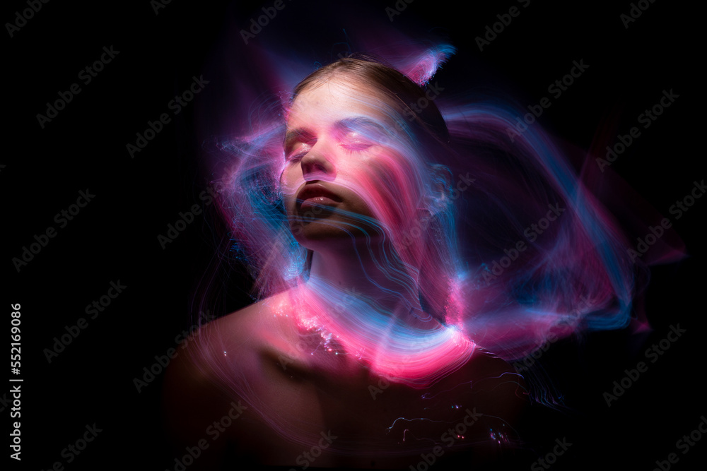 Abstract photography in the style of light painting. girl on a black background Abstract photography in the style of light painting. girl on a black background