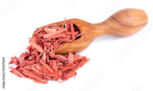 Red Sandalwood incense chips in wooden spoon, isolated on white background. Sanderswood, rubywood or red saunders. photo