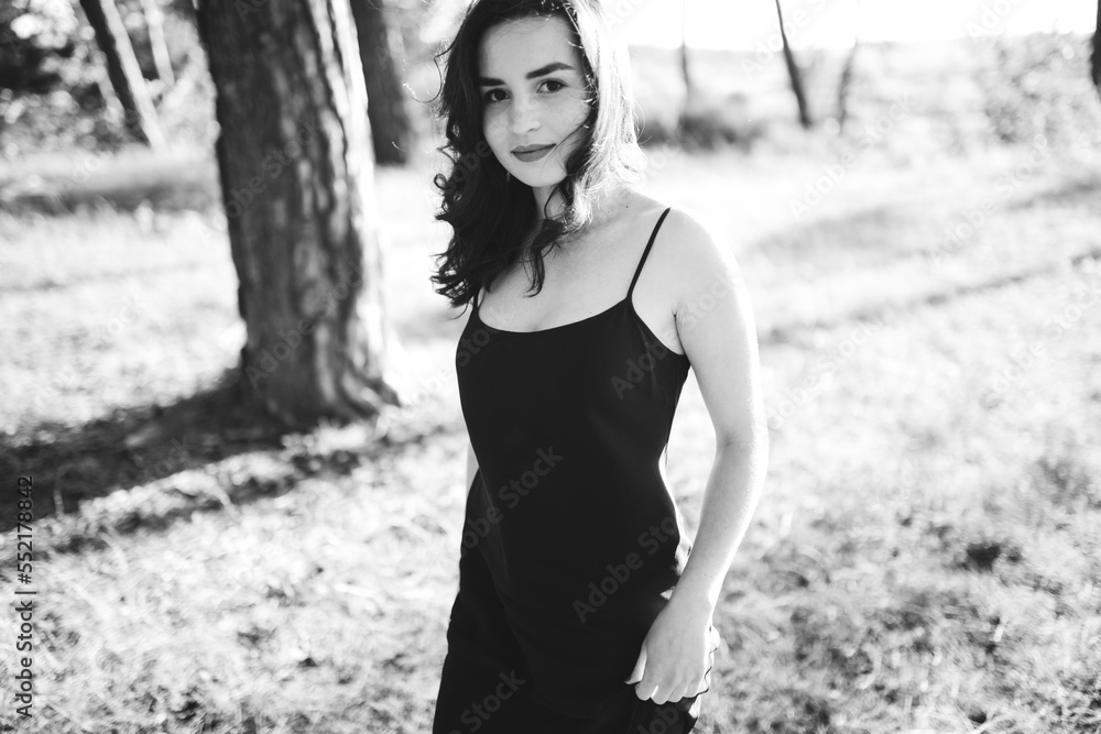 Young woman walking in forest Young woman walking in forest