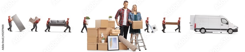 Workers from a removal company loading a van with a yyoung couple belongings Workers from a removal company loading a van with a yyoung couple belongings