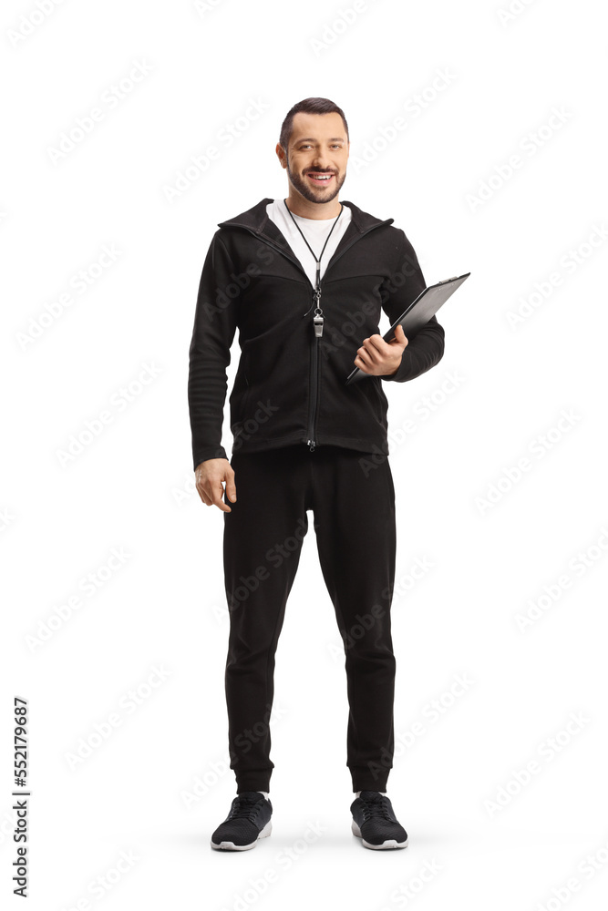 Sports coach with a whistle holding a clipboard and smiling at camera Sports coach with a whistle holding a clipboard and smiling at camera