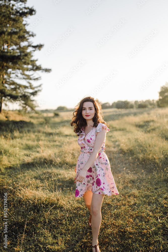 Young woman walking in forest